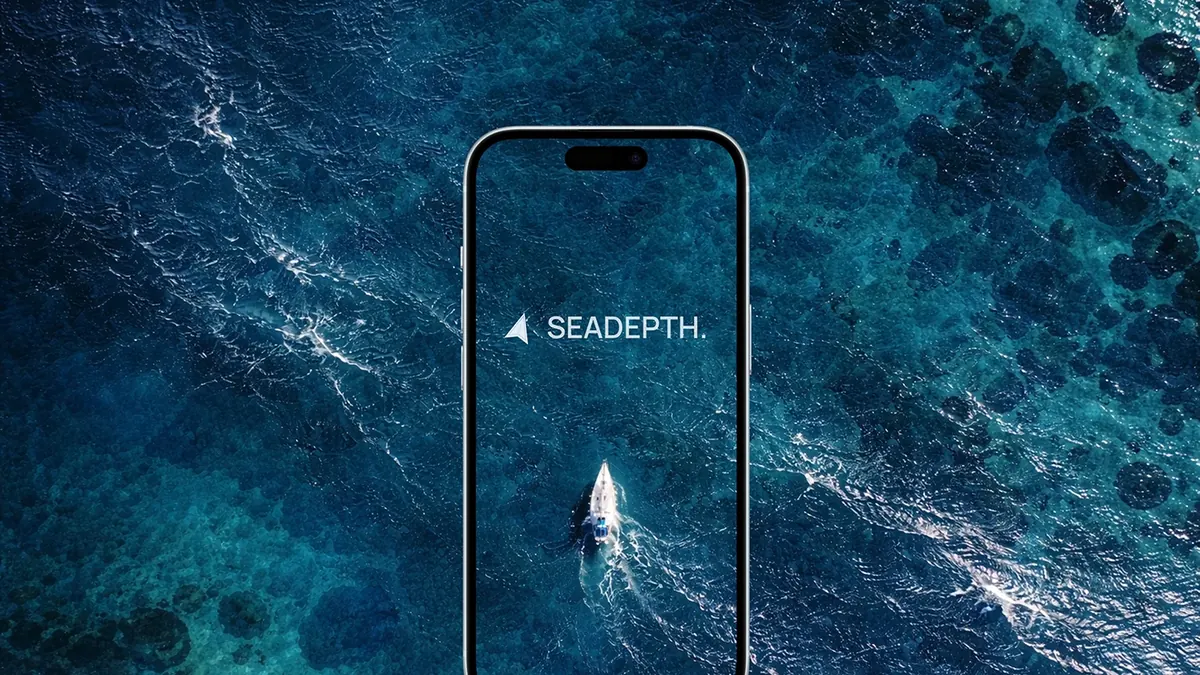 SEADEPTH app on a phone over the open sea